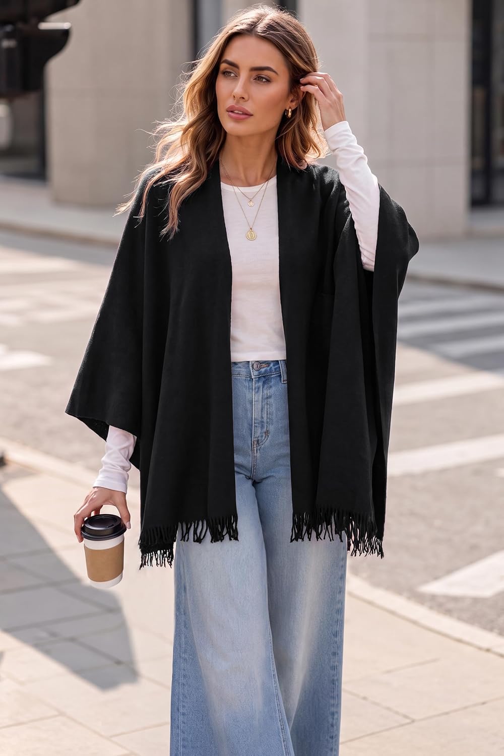 Arach&Cloz Wool-Blend Loop-Front Fringe Shawl — Black, worn open over a white top and jeans